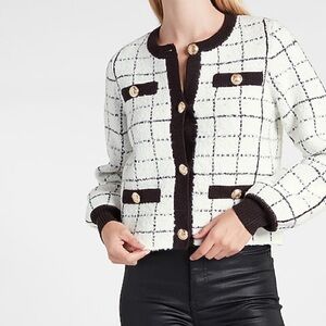 White and black plaid sweater